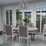 Plan 288-0235 dining room with large windows and a round table