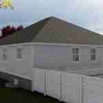 Plan 288-0136 Rear view of a single-story home with a gable roof