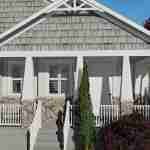 Plan 288-0136 Front view with a covered porch and stone accents