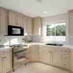 Plan 288-0097 Bright kitchen with light wood cabinetry and large window