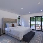 Plan 288-0237 primary bedroom with large windows and patio access