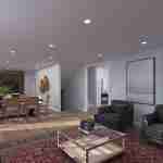 Plan 288-0266 Open living and dining area with modern decor and lighting