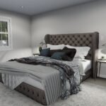 Plan 288-0267 primary bedroom with tufted headboard and large windows