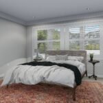 Plan 288-0155 primary bedroom with large windows and decorative rug