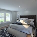 Plan 288-0270 primary bedroom with large windows and upholstered headboard