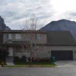 Plan 288-0246 Front view of a two-story home with a gable roof