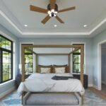 Plan 288-0242 primary bedroom with large windows and ceiling fan