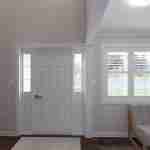 Plan 288-0129 interior view of an entryway with seating and windows