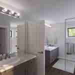 Plan 288-0129 primary bathroom with double vanity and walk-in shower
