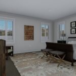 Plan 288-0253 primary bedroom with large windows and decorative accents