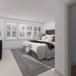 Plan 288-0255 primary bedroom with large windows and cozy decor