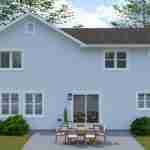 Plan 288-0131 Rear view of a two-story home with patio seating