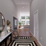 Plan 288-0258 interior view of a hallway with natural light and decor