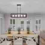 Plan 288-0118 dining room with large windows and modern lighting fixture