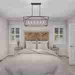 Plan 288-0118 primary bedroom with herringbone headboard and chandelier