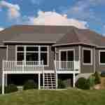 Plan 580-1354 Rear view of a modern home with a deck and large windows